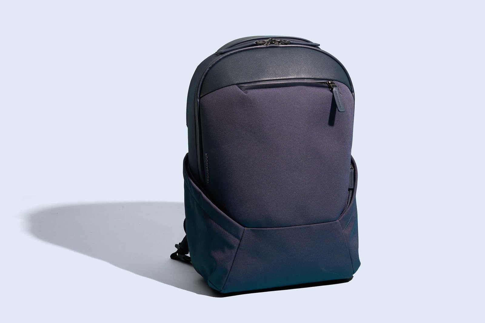 Various specialized laptop bags and accessories arranged for different travel scenarios.