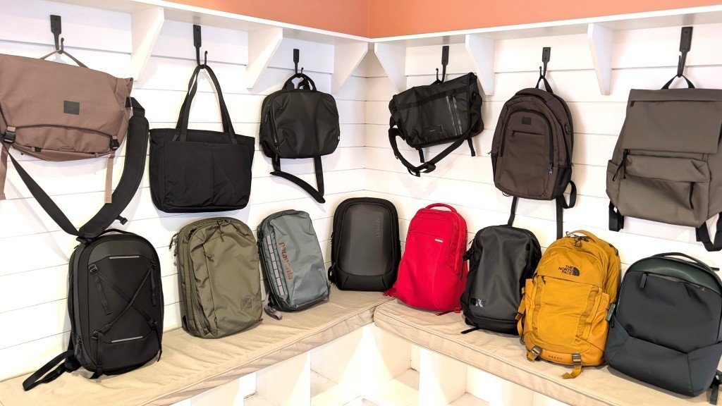 A laptop backpack resting on a desk in a clean and organized workspace.