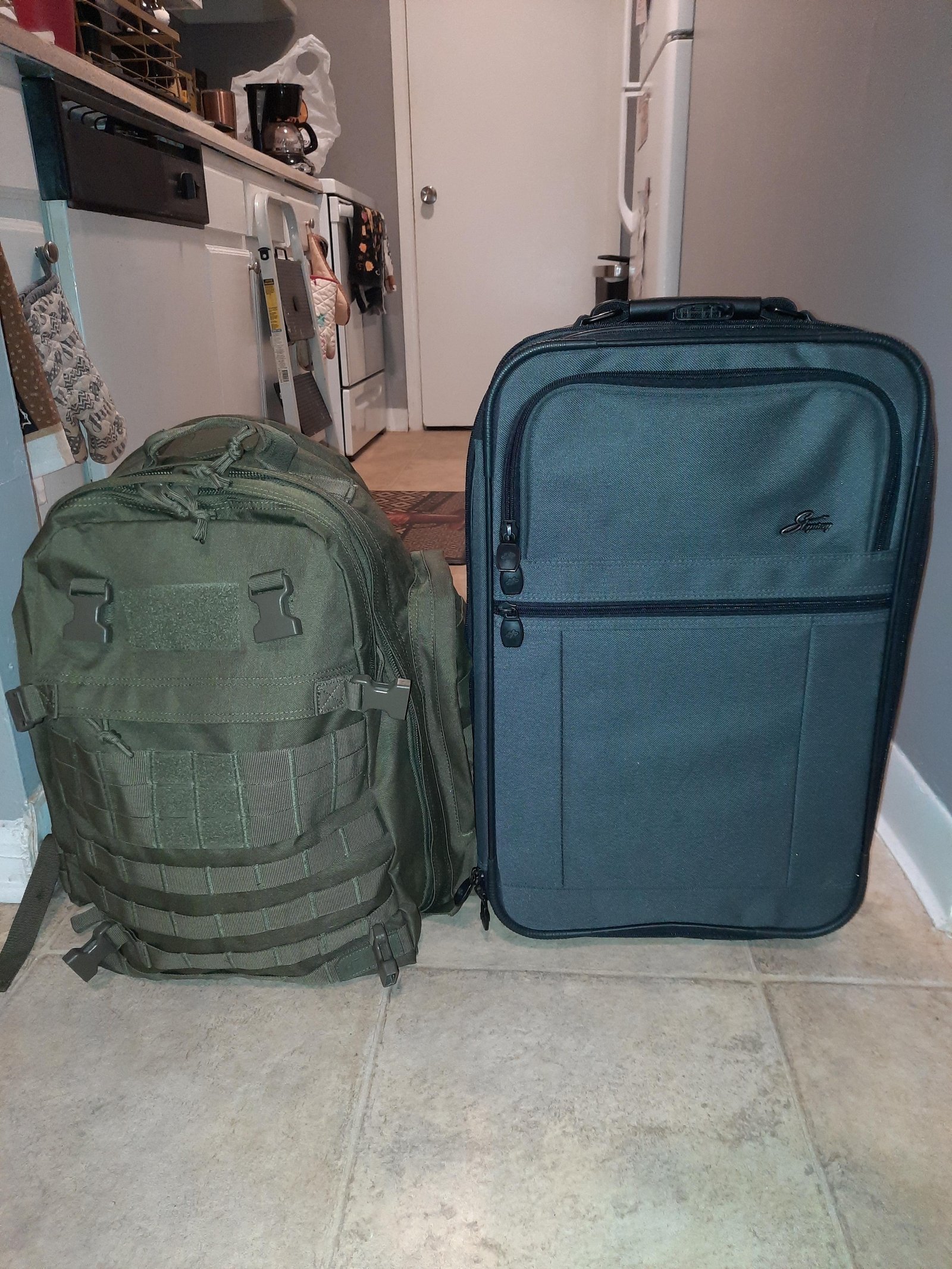 A travel checklist and backpack ready for a trip on a wooden desk.