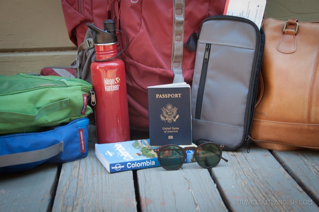 A traveler testing a well-fitted backpack to ensure proper weight distribution on hips.