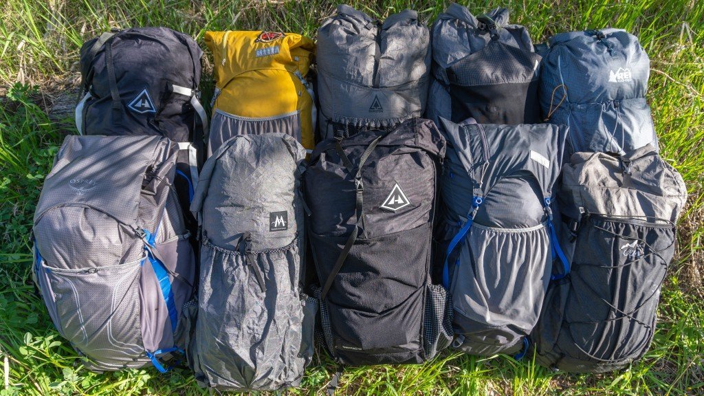 A person wearing a perfectly adjusted lightweight travel backpack that sits securely on their back.
