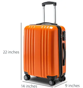 A passenger placing an oversized suitcase on the scale at an airport counter.