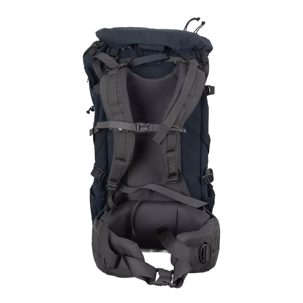 A traveler securing backpack straps inside a protective travel duffel bag cover.
