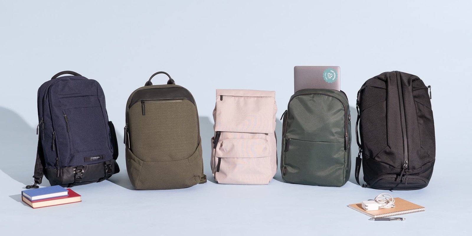 Person wearing an ergonomic laptop backpack that fits securely and comfortably on their back.