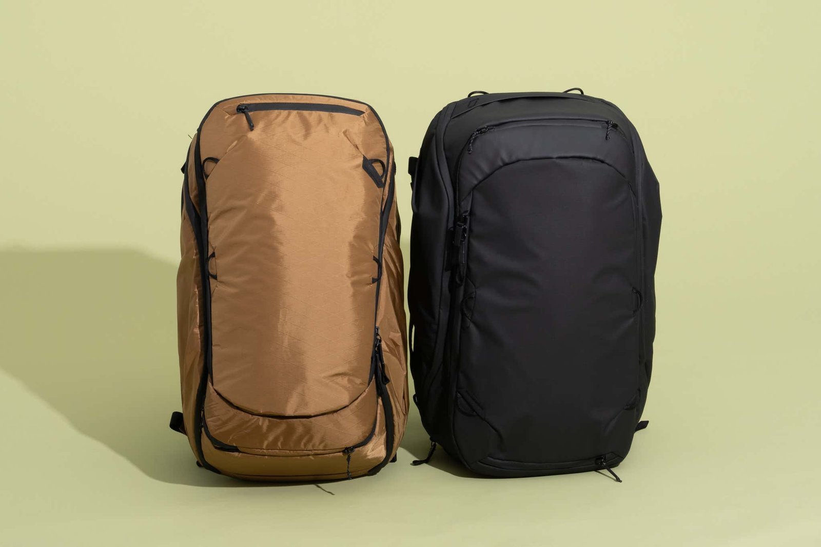 Three different types of travel bags arranged side-by-side for comparison.