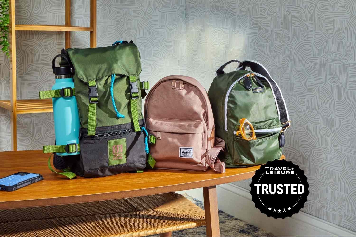A person zips a small travel backpack that fits perfectly into a sizer frame.
