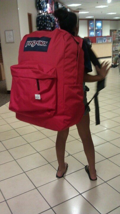 An external frame backpack and a technical climbing pack shown side by side.