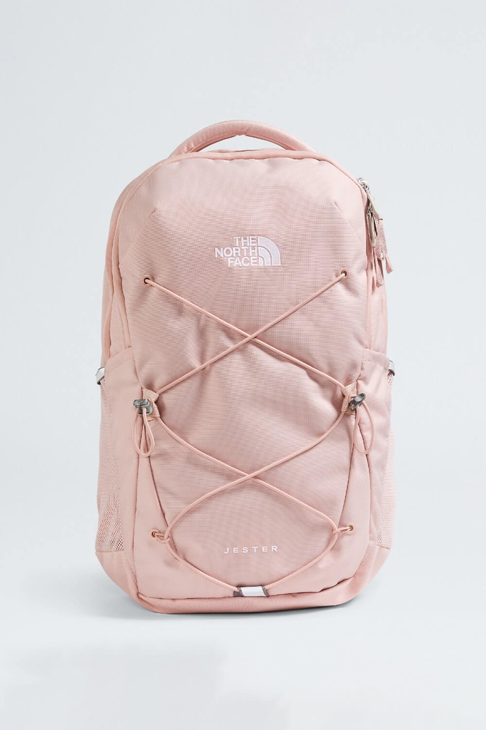 A person correctly adjusting the straps of a backpack for a comfortable fit.