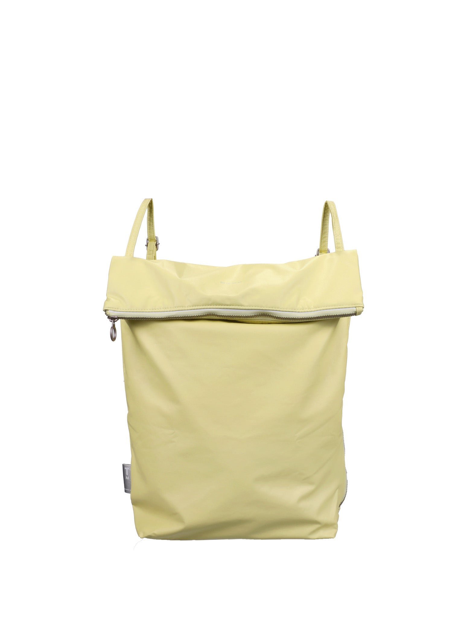 A person inspecting a backpack in a store, representing frequently asked questions about buying bags.