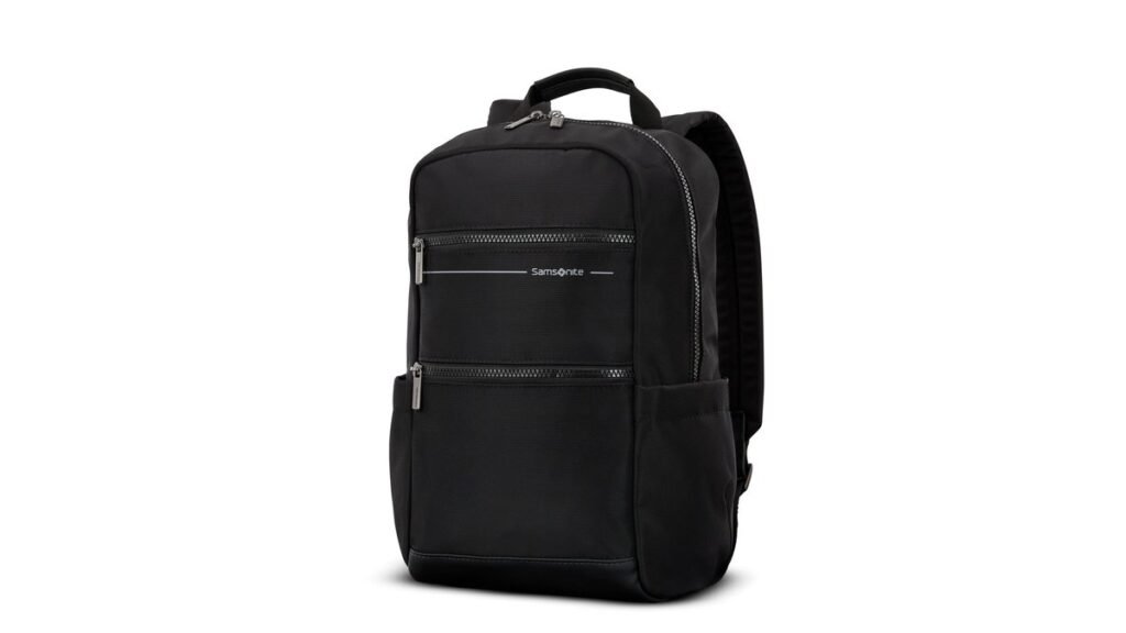 A modern, high-quality travel backpack sitting outdoors, representing the best places to buy backpacks.