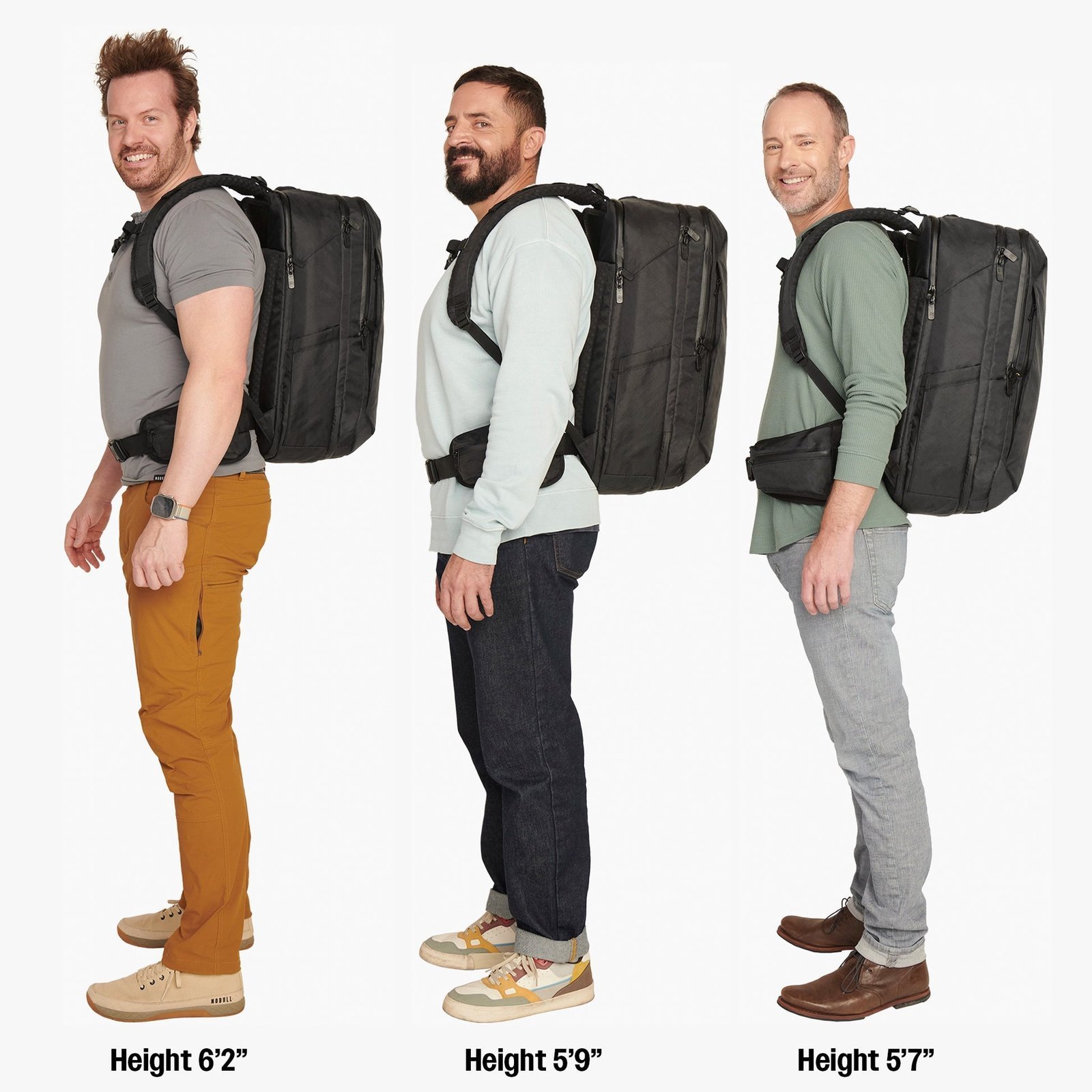 A hiker measuring their torso length to ensure a proper backpack fit.