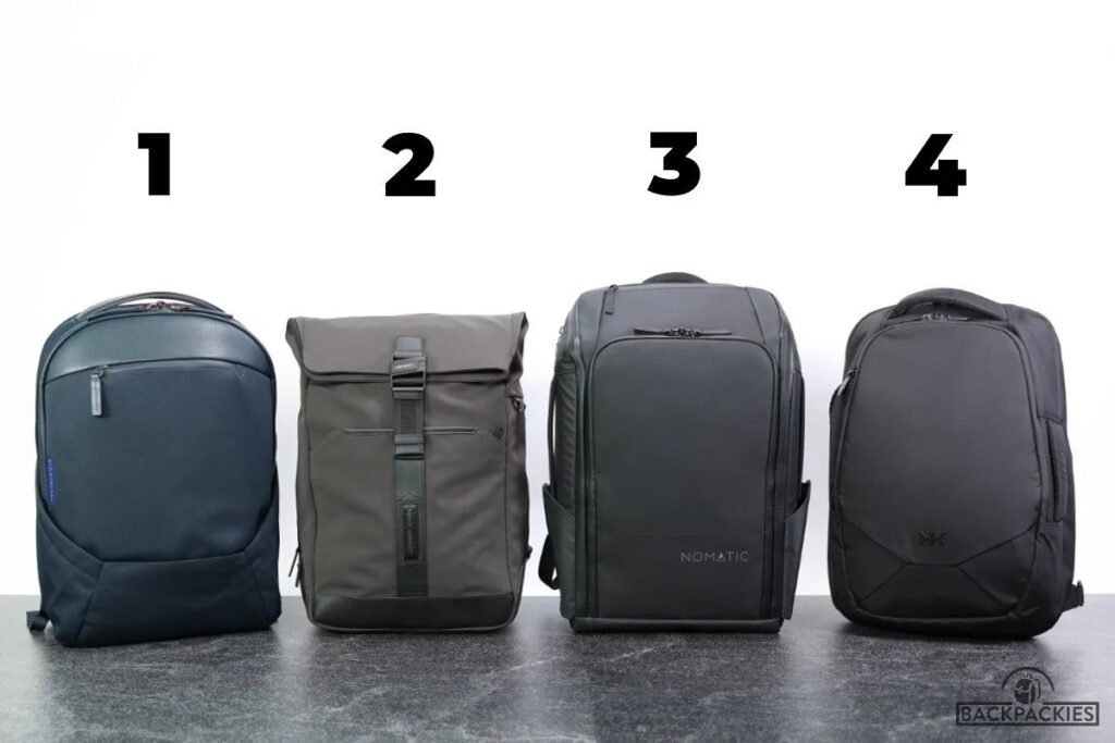 A professional travel backpack for business sits on a bench in a modern terminal.